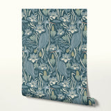 Art Nouveau style botanical pattern with blue-green tones featuring stylized flowers, leaves, and or