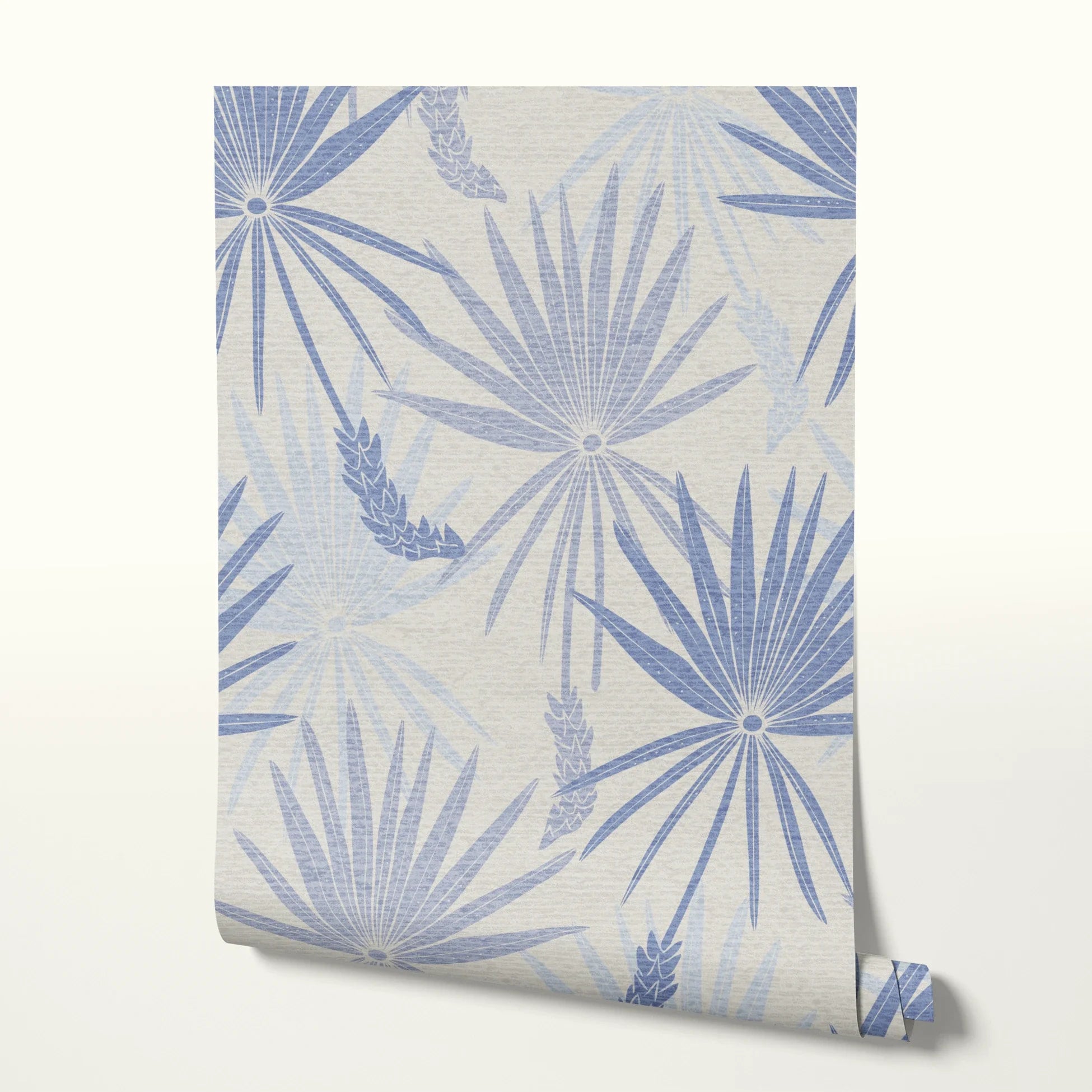 Blue and gray tropical palm fronds pattern on light textured background