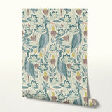 Decorative pattern with blue birds, lotus flowers, and foliage in muted teal, mauve, and cream tones