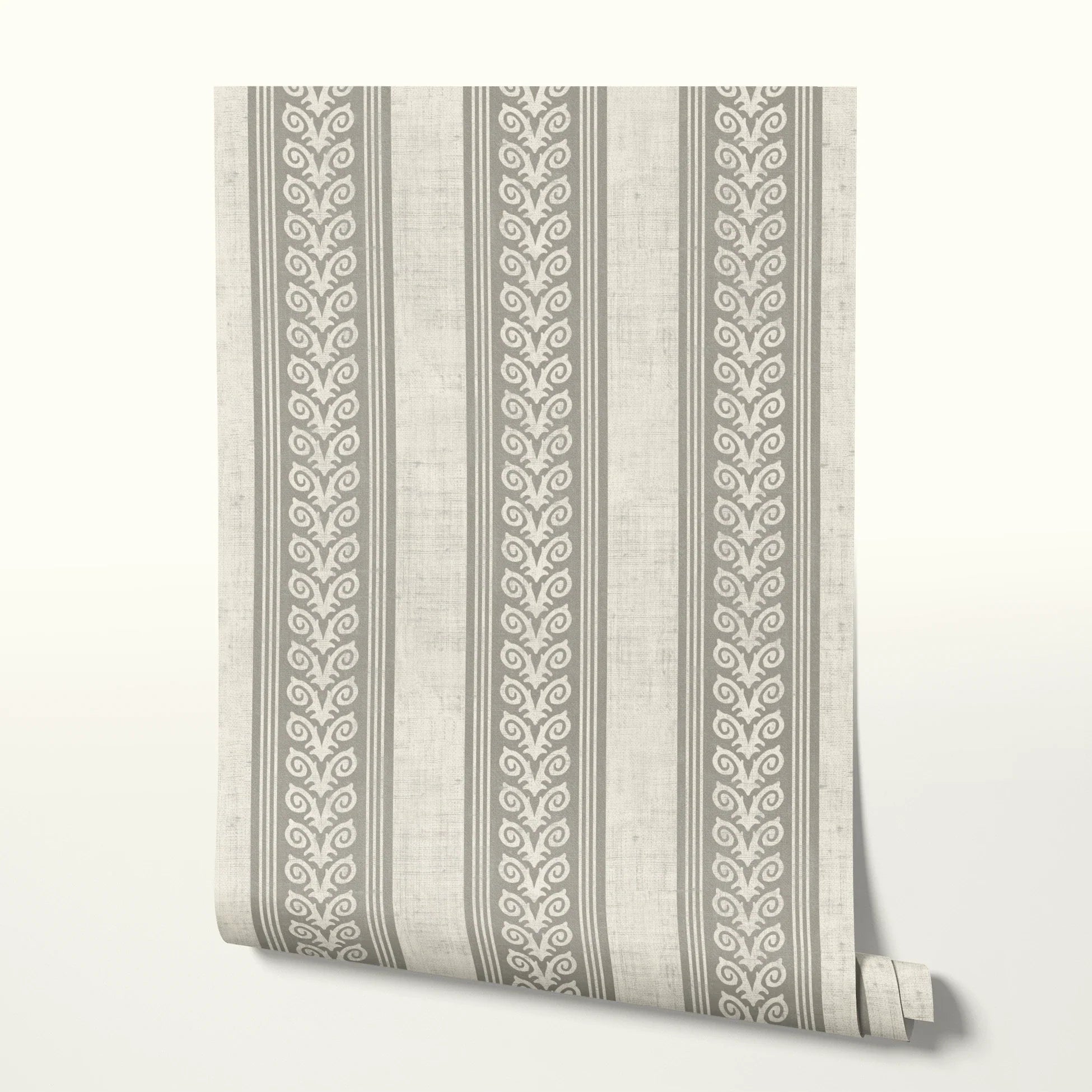 Vertical stripes pattern in beige and white with decorative scrollwork motifs alternating with plain