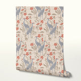 Herons and cranes among red flowers and beige foliage in Asian-inspired decorative pattern