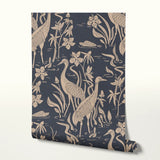 Herons and cranes among reeds and flowers in beige on dark navy blue background