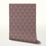 Art deco style pattern with stylized pinecones and fan shapes in muted rose and mauve tones