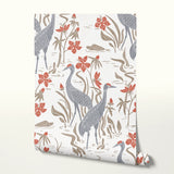 Decorative pattern with gray herons, beige rabbits, and coral-red flowers on white background