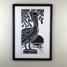 Load image into Gallery viewer, Brown Pelican and Live Oaks, limited edition black and white block print. Hand pulled on 12x18 paper
