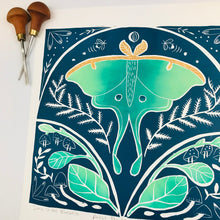 Load image into Gallery viewer, Luna moth in the Bluebells, Artist Proof Block print, Hand pulled with 16x16 inch mat
